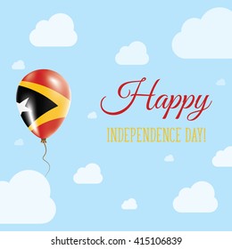 Flat Patriotic Poster for Independence Day of Timor-Leste. Single Balloon in National Colors of Timor-Leste Flying in the Air. Happy National Day Greeting Card. Vector illustration.