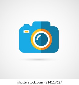 Flat photo camera icon.