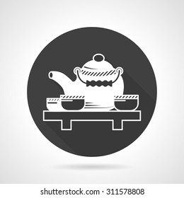 Flat round black vector icon with white contour tea set with teapot and cups for tea ceremony. Traditional beverages, asian menu. Design elements for business and website