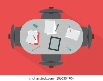 Flat rounded meeting table with wood texture on red background with four chairs and office supplies