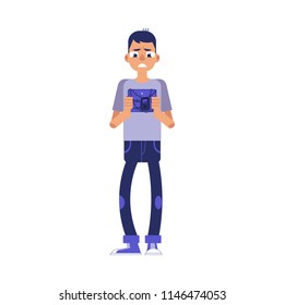 Flat sad frustrated young man standing clenching teeth in anger holding tablet with chain and lock. Prohibited website, application access concept. Internet ban teen male character emotions vector