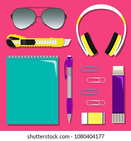 Flat school set of stationery on the table.