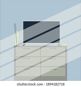 flat screen TV on the dresser black