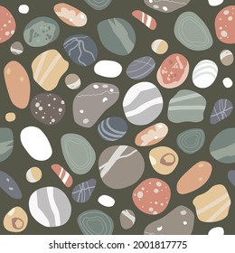 Flat sea pebbles seamless pattern. Small stones of different shapes and colors set.Vector illustration collection.