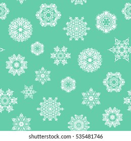 Flat snow doodle icons, snow flakes silhouette for christmas banner, cards. New year snowflake on green background. Cute abstract seamless snowflakes vector pattern.