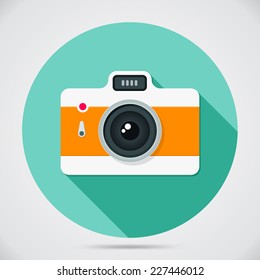 Flat style camera with long shadows. Vector icon illustration.