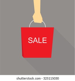 flat style illustration with hand holding shopping  bag to promotion sale.