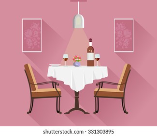  Flat style round restaurant table for two with white cloth, wine glasses, bottle of wine, plate and vase with flowers. Cafe interior with dinner table, chairs, lamp and pictures.