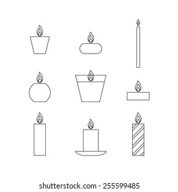 Flat thin line icons Christmas candles isolated on white background. Icons candles set. 9 different candles in flat style. Candles collection. Silhouettes of candles isolated on white background