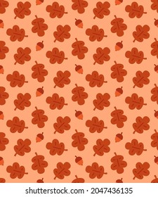 Flat vector background with acorns and oak leaves. Seamless autumn pattern design for wrapping paper, wallpapers and fabric