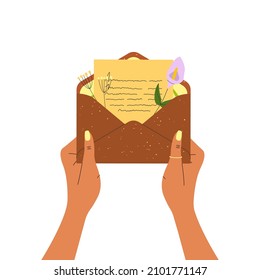 Flat Vector Cartoon Illustration Of Female Hands Holding An Open Craft Envelope With A Handwritten Letter And Flowers. A Love Letter, An Invitation, A Letter From Relatives.