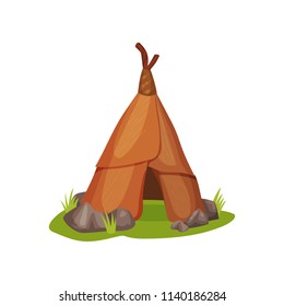 Flat vector icon of ancient man hut on green grass surrounded by small stones. Home of prehistoric people made of animal skin