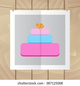 Flat vector icon. Color photo hanging on a rope. Cake.