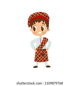 Flat vector icon of little boy in traditional Scottish kilt costume. Child wearing shirt, bright red plaid skirt and hat