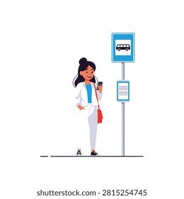 A flat vector illustration of a cheerful young woman standing at a public bus stop. She is holding a smartphone and smiling, likely checking a transit app or messaging while waiting for her ride. The scene features a blue bus stop sign and a schedule board on a clean white background. She is dressed in a stylish white outfit with a red crossbody bag, representing modern urban life.