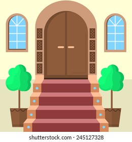 Flat vector illustration of facade doors with stairs. Brown wooden arch door with symmetry two windows, stairs with red carpet and two symmetry decorative trees. Flat design vector icon for building