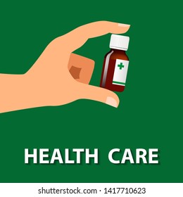 Flat vector illustration of a hand holding a medicine bottle and Health Care written at the bottom. Health care concept illustration. Green background.