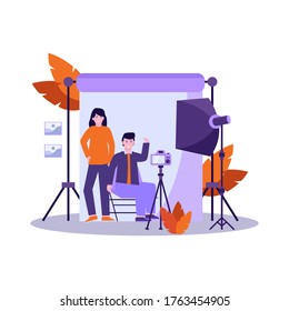 Flat vector illustration of photographer prepares equipment and takes a photo of the model professionally for landing page, ui, mobile app and website