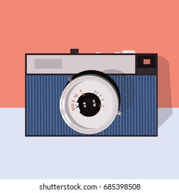 Flat vector illustration of retro camera.