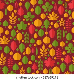Flat vector illustration: seamless pattern made of different tree leaves silhouettes (green, yellow and red) isolated on dark red background