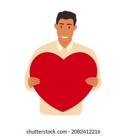 Flat vector illustration of a smiling man holding a big heart. The concept of mutual assistance, support, love, donations. Isolated design on a white background.