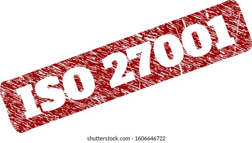 Flat vector ISO 27001 rubber imitation with grunge style. Rounded rough rectangle stamp. Red scratched stamp with ISO 27001 title inside rounded rough rectangle.