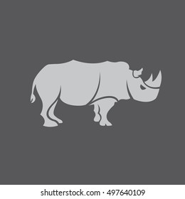 A flat vector rhino icon on a dark gray background.