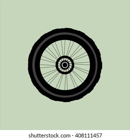 flat vector silhouette of a bicycle wheel with tire and spokes