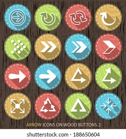 Flat White Arrow Contemporary Icons on Wood Vintage Circular Buttons on Black Background 2.