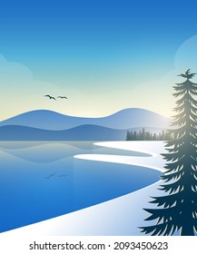 flat winter landscape of lake with mountains in the morning