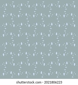 Flecked geometric pattern in shades of blue. Simple textile design.