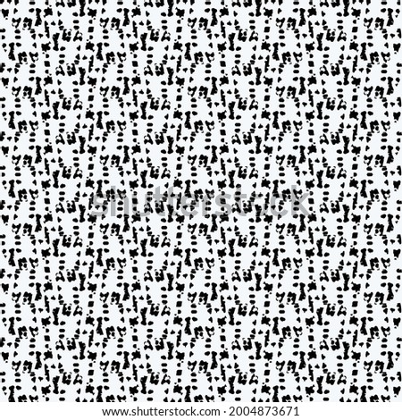 Flecked pattern crossed by some subtle zigzags. Abstract knit texture. Decorative graphics in black and white.