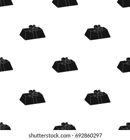 A flesh-colored gift with a red bow. Sweet present.Gifts and Certificates single icon in black style vector symbol stock illustration.