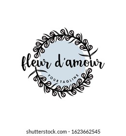 Fleur d'Amour circle flowers feminine logo design  elegant floral wreath emblem with romantic flower elements, perfect for wedding brands, beauty salons, fashion boutiques, or luxury feminine product