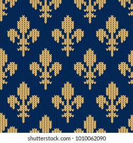 Fleur-de-lis on a seamless vector woolen pattern. Knitted woolen pattern with Heraldic golden royal lilies on blue