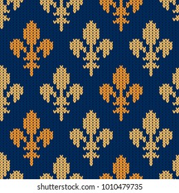 Fleur-de-lis on a seamless vector woolen pattern. Knitted woolen pattern with Heraldic golden royal lilies on blue