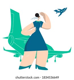 flight attendant standing at the airport and looking on the airplane