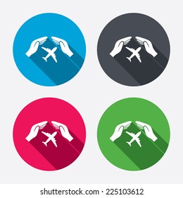 Flight insurance sign icon. Hands protect cover plane symbol. Travel insurance. Circle buttons with long shadow. 4 icons set. Vector