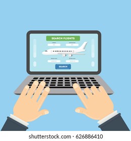 Flight ticket search. Hands typing on laptop for online booking.
