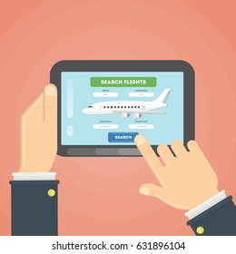 Flight ticket search. Hands typing on tablet for online booking.