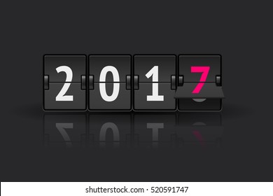 Flip board clock changing to 2017. New Year concept. Analog scoreboard flip calendar changes to another year. Digital countdown timer with 2017 numbers represents time going forward.