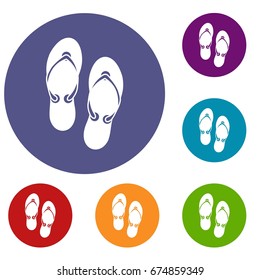 Flip flop sandals icons set in flat circle reb, blue and green color for web