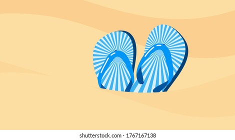 Flip flops on a sandy sea beach.