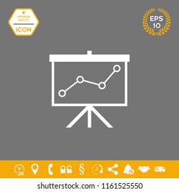 Flip-chart, projection screen with a graph.