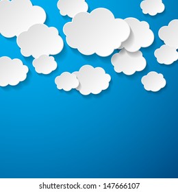 Floating Paper Clouds Background - Vector floating paper clouds on a blue background.  EPS10 file with transparency.