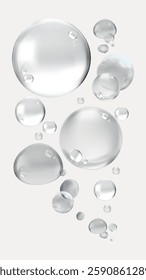 Floating transparent bubbles on a white background. Bubbles vary in size, creating a light, airy feel. Bubbles are clear and spherical, enhancing the airy effect. Soap bubble element vector set.
