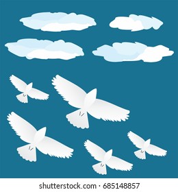 Flock of birds in the clouds