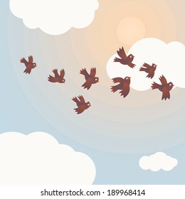 Flock of birds flying in the sky with clouds and sun.