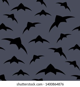 A flock of birds in the sky. Seamless pattern. Dark vector background EPS10