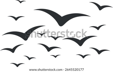 A flock of birds stands out against a light background. The birds are black and vary in size, with a larger, more prominent bird in the center.